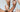 A close up of three pairs of hands, posed expressively among one another.