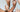 A close up of three pairs of hands, posed expressively among one another.